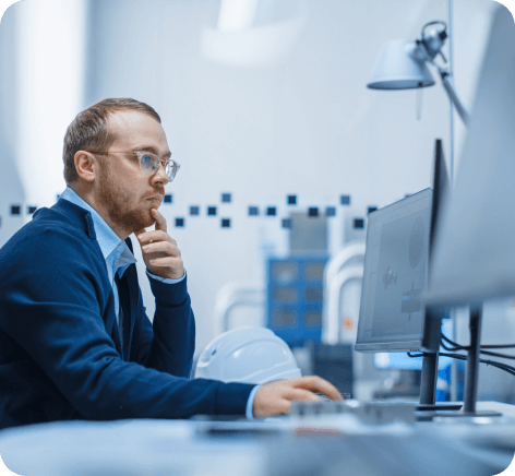 a man sitting at a computer