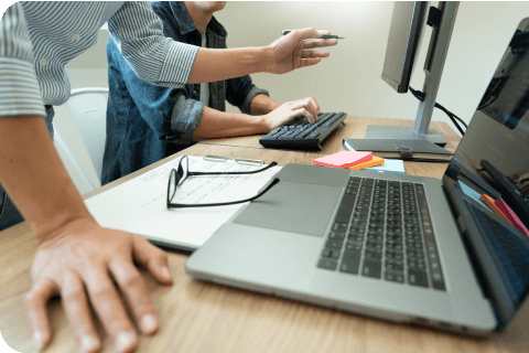 two workers working on an issue