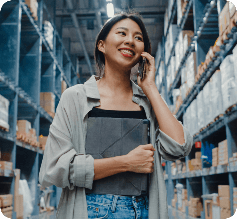 Young woman standing in a warehouse